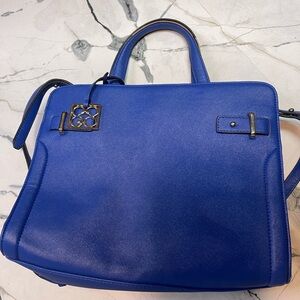 blue vegan leather handbag with gold hardware